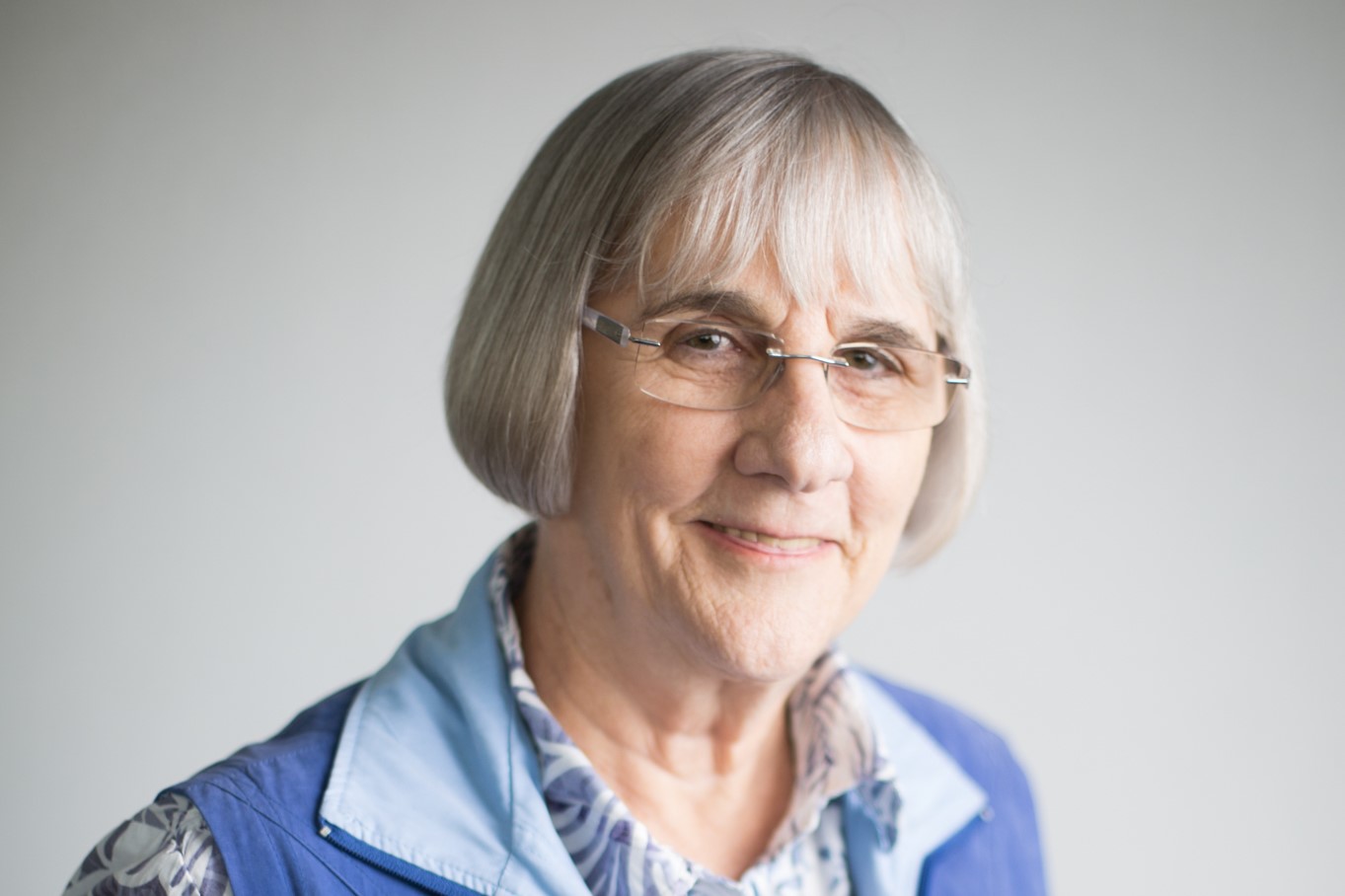 Elaine Unkles OAM, Board member Lady with short hair and glasses