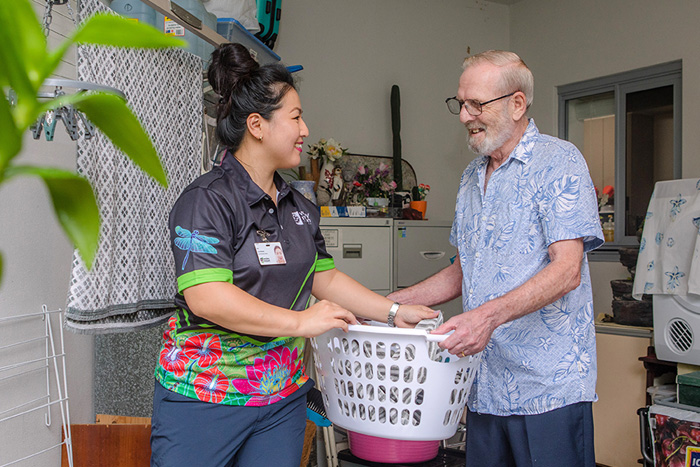 Home Care Brisbane - Staff helps with the laundry Home Care Brisbane - Staff helps with the laundry