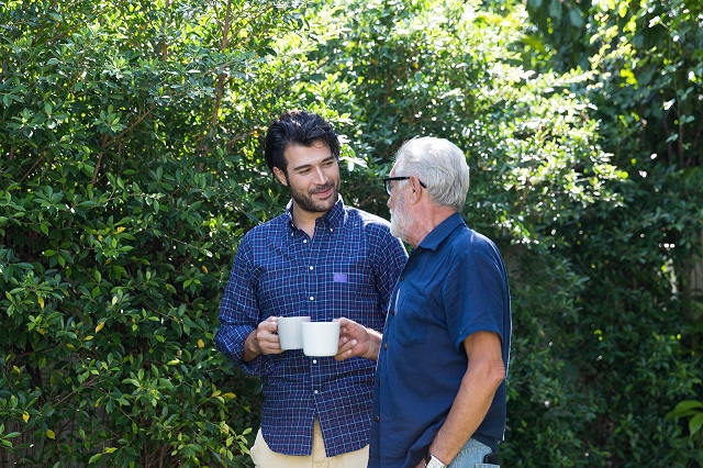 Aged care resident and volunteer talking in a park as part of the Volunteer Visitor scheme Aged care resident and volunteer talking in a park as part of the Volunteer Visitor scheme