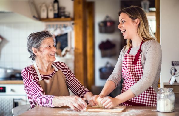 Home help with Wesley Mission Queensland In home assistant helping a resident with baking