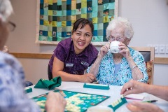 Dovetree residents enjoying a game of scrabble