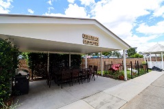 Outdoor patio area with table and chairs