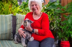 Resident with her dog at St Mark's aged care community