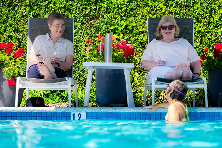Rosemount Retirement Village - Friends relaxing in outdoor heated pool Rosemount Retirement Village - Friends relaxing in outdoor heated pool