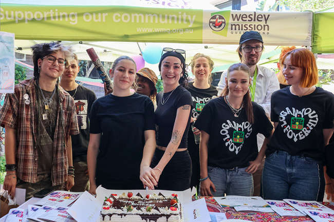 Young participants cut the cake at Logan Youth Foyer annual celebration